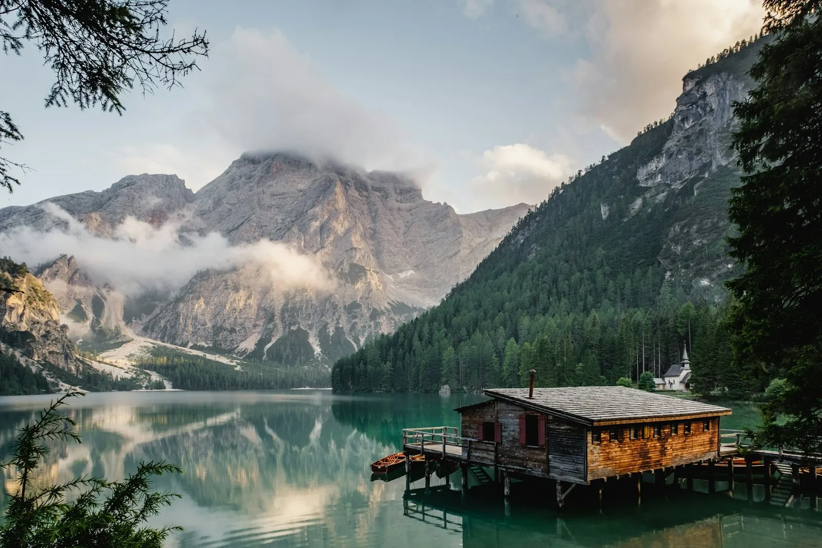 A mountain lake surrounded by trees.
